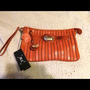Marc Chantal (M.C.) clutch purse.
